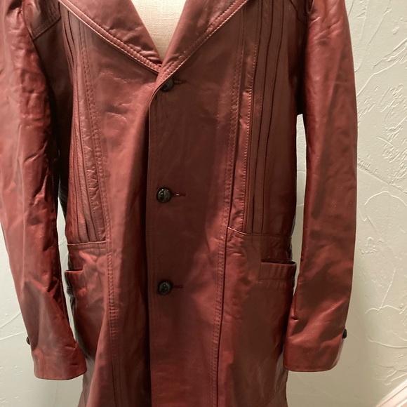 Montgomery Ward
Vintage brown/red leather coat
44L - Picture 7 of 14